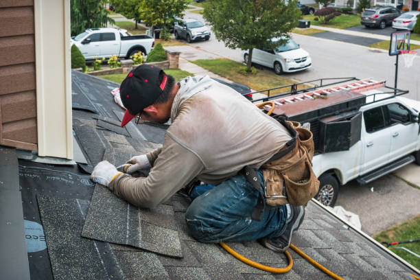 Professional Roofing technician working in Kennebunk, ME